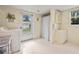 Practical laundry area with a sink, washer, and outdoor access, simplifying laundry tasks with added convenience at 330 N Stone St, Deland, FL 32720