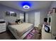 Inviting bedroom featuring a comfortable bed, vanity, and ample storage space at 3702 Mirror Lake Dr, Apopka, FL 32703