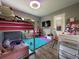Colorful bedroom with bunk beds and ample play space at 3702 Mirror Lake Dr, Apopka, FL 32703