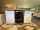 Kitchen island with wine cooler and a wood countertop at 3702 Mirror Lake Dr, Apopka, FL 32703