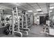 On site gym featuring weight training machines, free weights, and mirrors at 400 E Colonial Dr # 1103, Orlando, FL 32803