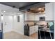 Contemporary kitchen with white cabinets, marble accents, and stainless steel appliances, offering modern functionality and style at 400 E Colonial Dr # 1103, Orlando, FL 32803