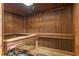 This private sauna features wooden walls and benches, creating a cozy and relaxing retreat at 400 E Colonial Dr # 1103, Orlando, FL 32803