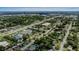 Wide aerial shot showcasing neighborhood, nearby commercial area, and major thoroughfare at 418 Tulane Dr, Altamonte Springs, FL 32714