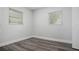 Bedroom with hardwood floors, bright light, and white trim at 418 Tulane Dr, Altamonte Springs, FL 32714