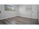 Bedroom with two windows and white trim and doors at 418 Tulane Dr, Altamonte Springs, FL 32714