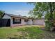 Charming single story home with white exterior, manicured lawn, and mature landscaping at 418 Tulane Dr, Altamonte Springs, FL 32714