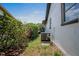 Exterior shot showing side of the house and the A/C unit at 418 Tulane Dr, Altamonte Springs, FL 32714
