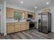 Modern kitchen featuring stainless steel appliances and sleek countertops at 418 Tulane Dr, Altamonte Springs, FL 32714