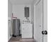 Laundry room with washer, dryer, and water heater at 418 Tulane Dr, Altamonte Springs, FL 32714
