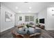 Bright living room with modern decor and stylish marble table centerpiece at 418 Tulane Dr, Altamonte Springs, FL 32714