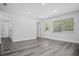 Bright living room with clean finishes, two doors, and large windows at 418 Tulane Dr, Altamonte Springs, FL 32714