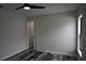 This bedroom features a modern ceiling fan and modern flooring at 508 Bennett St, Auburndale, FL 33823