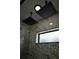 This bathroom showcases the dual shower heads in the glass enclosed shower at 508 Bennett St, Auburndale, FL 33823