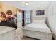 Comfortable bedroom with painted wall, providing a relaxing retreat at 5255 Wildwood Way, Davenport, FL 33837