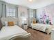bedroom with princess mural at 5255 Wildwood Way, Davenport, FL 33837