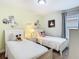 Charming bedroom with twin beds and cheerful Mickey Mouse decor at 5255 Wildwood Way, Davenport, FL 33837