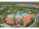 Aerial view of the community pool, showcasing its tropical design and inviting atmosphere at 5255 Wildwood Way, Davenport, FL 33837