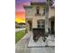 Inviting two-story townhome with well-maintained landscaping and charming architectural details at 5515 Paradise Cay Cir, Kissimmee, FL 34746