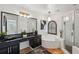Bright bathroom featuring double vanities, a soaking tub, and a glass-enclosed shower at 602 E Livingston St # 3, Orlando, FL 32803