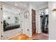 Bedroom features an exposed staircase, modern decor, and access to a backyard patio at 602 E Livingston St # 3, Orlando, FL 32803