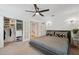 Spacious bedroom with a walk-in closet, modern decor, and neutral color palette at 602 E Livingston St # 3, Orlando, FL 32803