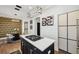 Chic kitchen with a central island cooktop and a stylish dining area in the background at 602 E Livingston St # 3, Orlando, FL 32803