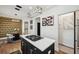 Chic kitchen with a central island cooktop and a stylish dining area in the background at 602 E Livingston St # 3, Orlando, FL 32803