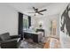 Home office with ample natural light, modern desk, and stylish decor for productivity at 602 E Livingston St # 3, Orlando, FL 32803