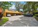 Large parking area with spaces under an open air structure for shade at 602 E Livingston St # 3, Orlando, FL 32803
