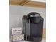 Cozy coffee station featuring a Keurig machine and a welcoming 'coffee nook' sign, perfect for morning routines at 746 Longboat Dr, Davenport, FL 33896