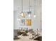 Stylish dining area featuring modern pendant lighting, a well-set table, and eye-catching abstract art in the background at 746 Longboat Dr, Davenport, FL 33896