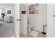 Half bathroom near the main bedroom offering convenience and style at 746 Longboat Dr, Davenport, FL 33896