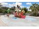 Outdoor water park showcasing a boat themed water play structure with slides and splash pad at 746 Longboat Dr, Davenport, FL 33896