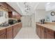 A kitchenette with sleek cabinets, countertop space, and appliances in the clubhouse is ideal for community events at 8035 Bayside View Dr, Orlando, FL 32819