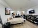 Spacious bedroom featuring wood flooring, modern furniture, and lots of storage space at 807 Knightsbridge Cir, Davenport, FL 33896