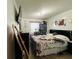 Comfortable bedroom with a decorative bedspread and closet, filled with natural light at 807 Knightsbridge Cir, Davenport, FL 33896