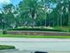 West Haven community sign surrounded by lush greenery and landscaping welcomes residents and visitors at 807 Knightsbridge Cir, Davenport, FL 33896