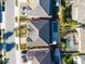 Overhead view of a home with a private pool, and well-maintained landscaping at 8085 Ludington Cir, Orlando, FL 32836