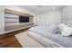 Inviting bedroom featuring a comfortable bed, stylish built-in shelves, and neutral decor for a peaceful retreat at 8085 Ludington Cir, Orlando, FL 32836