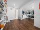 Spacious walk-in closet with custom shelving and hardwood floors offer ample storage solutions and organization at 8085 Ludington Cir, Orlando, FL 32836