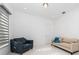 Inviting sitting area with plush seating and a serene, minimalist design at 8085 Ludington Cir, Orlando, FL 32836