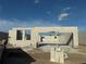 New home construction site showing concrete block walls and rough openings under a blue sky at 817 River Stone Trl, Sanford, FL 32771