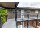 Balcony view of unit with door, railings, and exterior features at 851 Miles Ave # 8, Winter Park, FL 32789