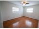 Inviting bedroom with ceiling fan and natural light, ready for personalized comfort at 851 Miles Ave # 8, Winter Park, FL 32789