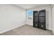 Cozy bedroom with a display case and window creating a serene retreat at 8975 Fluffy Lie Ct, Davenport, FL 33896
