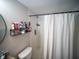 This bathroom has a shower with storage and nice tile work at 952 Courtyard Ln # 41, Orlando, FL 32825