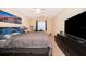 Bedroom features neutral walls, carpeted floor, a ceiling fan, and a window for natural light at 9539 Silver Buttonwood St, Orlando, FL 32832