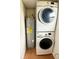 Convenient laundry area with stacked washer and dryer and water heater at 10301 Us Highway 27 # 34, Clermont, FL 34711