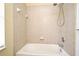 Bathroom with shower and tub combo and tile surround at 1086 Wickerwood St, Ocoee, FL 34761